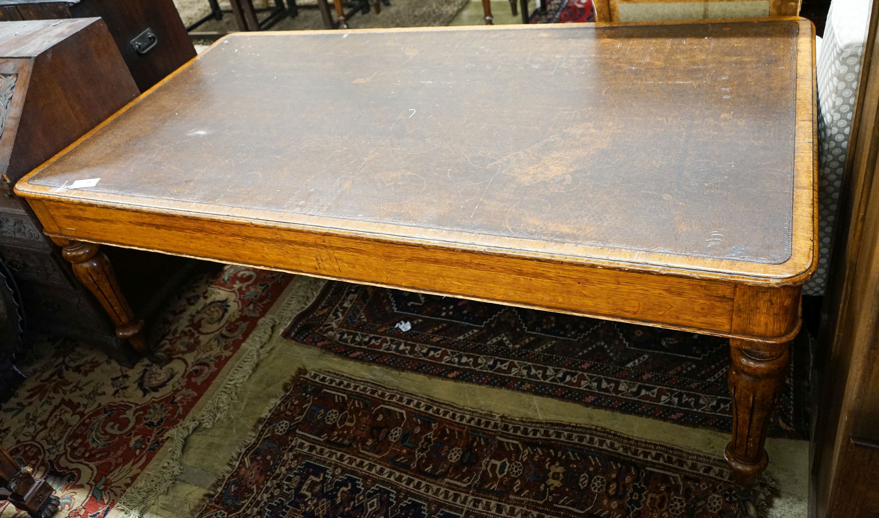 An early Victorian oak library table fitted two end drawers, from the Library of The Royal College of Surgeons, London, width 196cm, depth 105cm, height 76cm